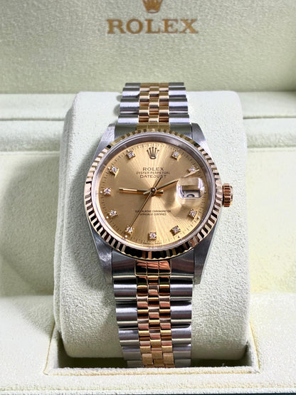 Rolex Datejust 36 16233G Champagne  with Original Paper